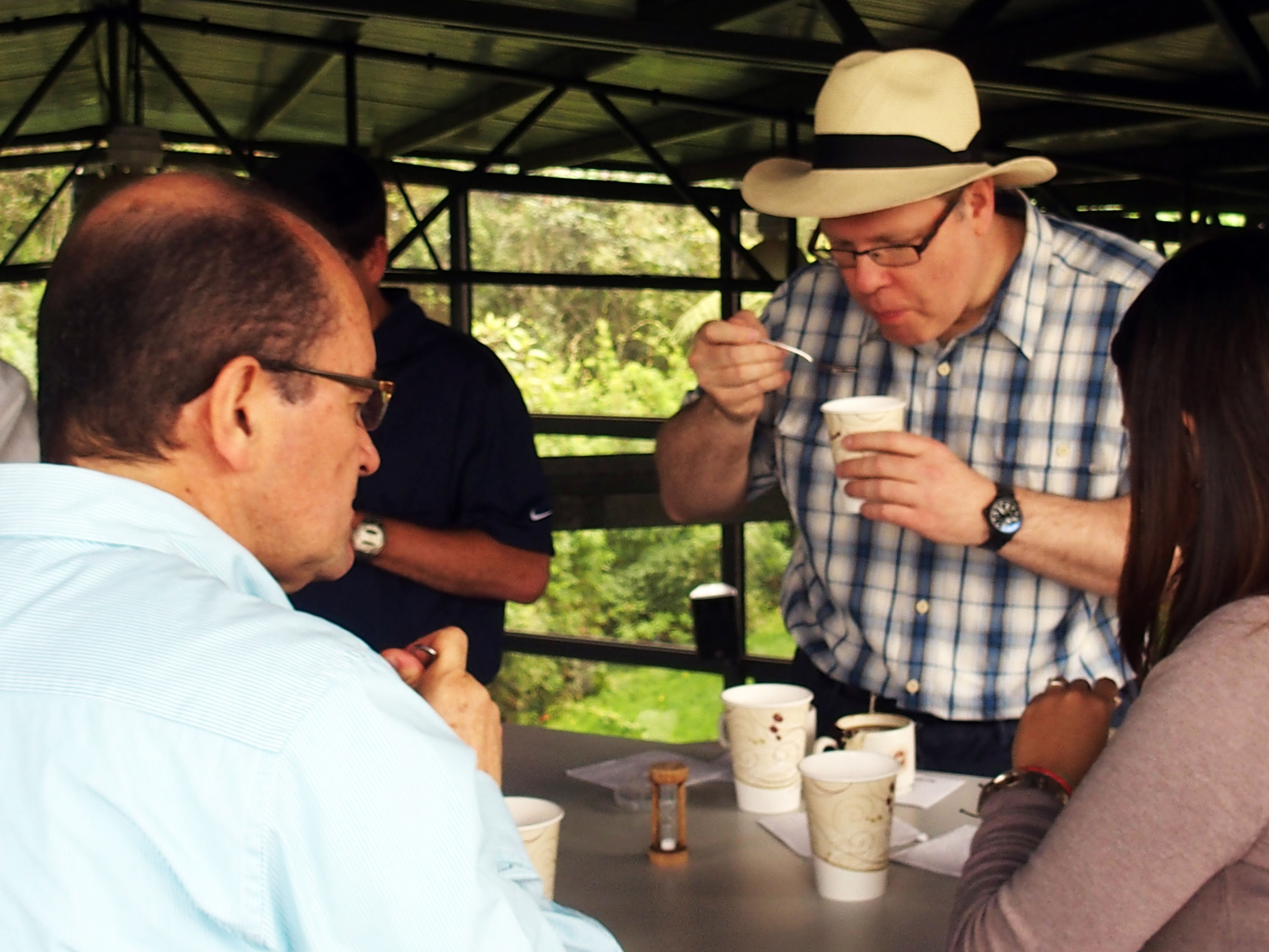 Cupping coffee at origin