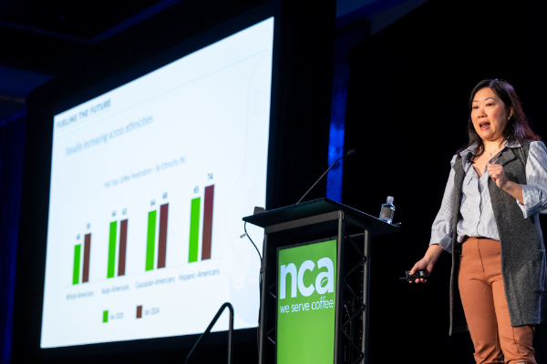 Cheryl Hung presenting on the National Coffee Data Trends at the NCA Convention