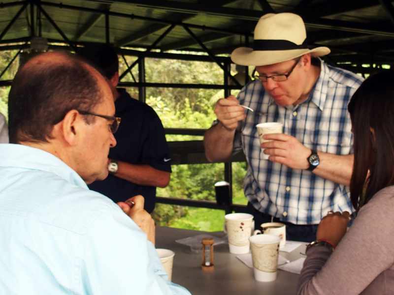 Cupping coffee at origin